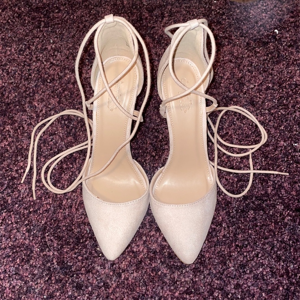 Never Worn lace up heels. Size 7. Charlotte Russe.